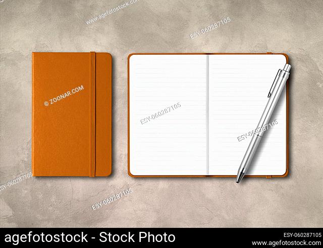 Leather closed and open lined notebooks with a pen . Mockup isolated on concrete background