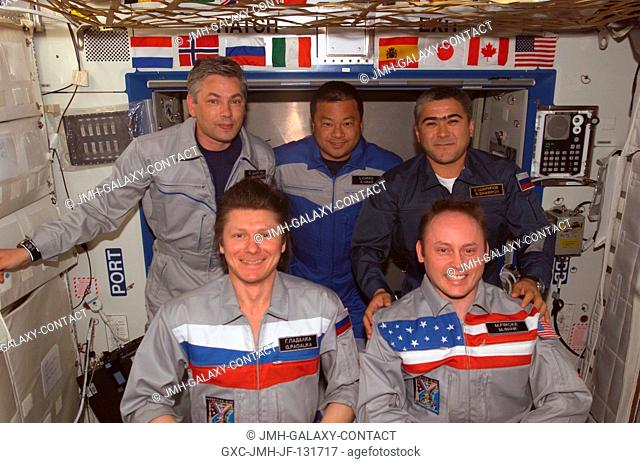 The crewmembers onboard the International Space Station (ISS) gather for a group portrait in the Destiny laboratory. From the left (front row) are cosmonaut...