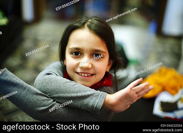 Little girl playing at home