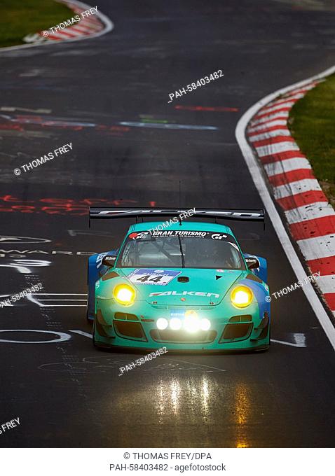 Teams Falken's Porsche 997 GT3 with drivers Peter Dumbreck, Wolf Henzler, Martin Ragginger and Alexandre Imperatori in action on the ractetrack during the 24...