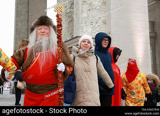RUSSIA, MOSCOW - DECEMBER 10, 2023: Sook Irei (L), the Tuvan Father Frost, attends a celebration of his birthday during the Russia Expo international exhibition...