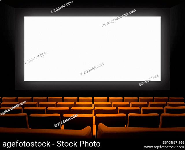Cinema movie theatre with orange velvet seats and a blank white screen. Copy space background