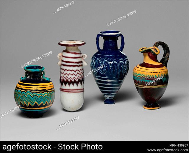 Glass alabastron (perfume bottle). Period: Classical; Date: late 6th-5th century B.C; Culture: Greek, Eastern Mediterranean; Medium: Glass; core-formed