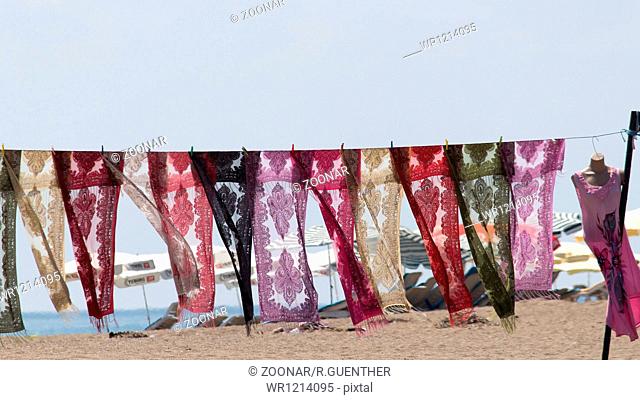 Silk scarves on the beach