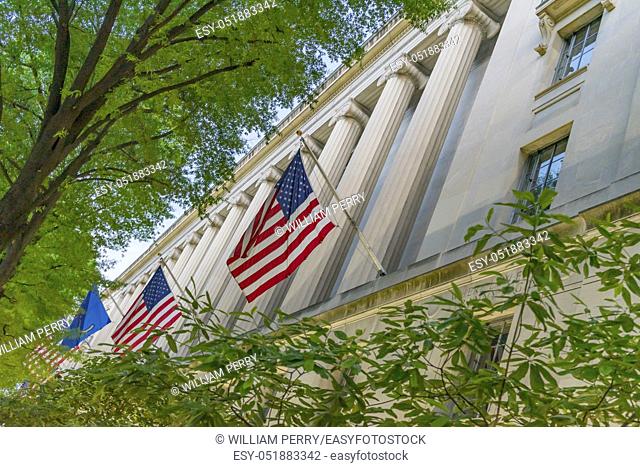 Facade Flags Robert F Kennedy Justice Department Building Pennsylvania Avenue Washington DC Completed in 1935. Houses 1000s of lawyers working at Justice