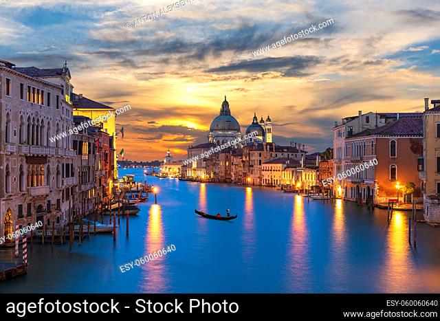 Grand Canal of Venice with a lonely gandolier at sunset, Italy