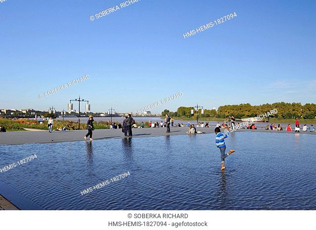 France, Gironde, Bordeaux, Bourse square, Water Mirror work of Michel Corajoud, child walking on the water