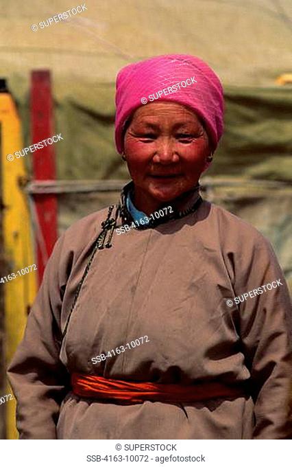 MONGOLIA, NEAR ULAN BATOR, GRASSLAND, YURT CAMP, LOCAL WOMAN