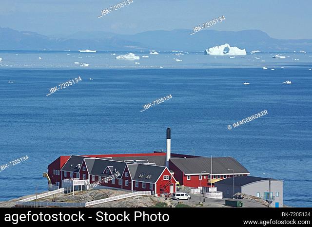 The hospital of Ilulissat, a bay with icebergs, Ilulissat, Disko Bay, Arctic, Greenland, Denmark, North America