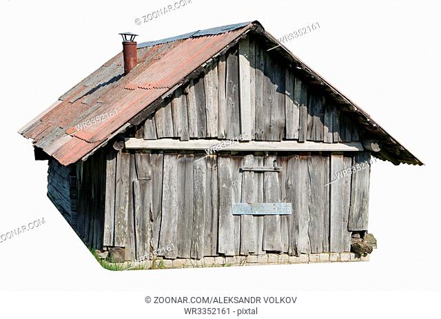 Usual no name wooden rural locked barn for storage of firewood and agricultural tools. Isolated
