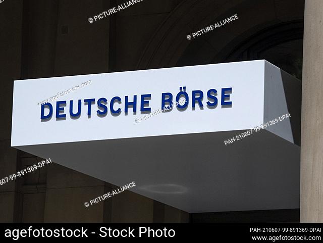 17 May 2021, Hessen, Frankfurt/Main: The ""Deutsche Börse"" lettering on the outside of the trading hall in Frankfurt. Photo: Boris Roessler/dpa