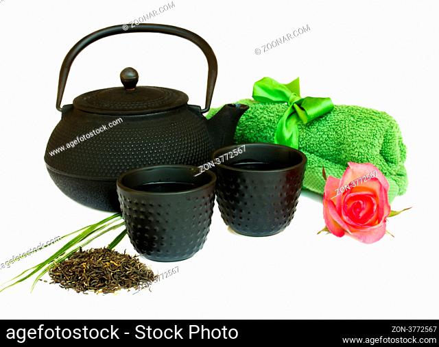 asian tea set with flower and towels isolated on white background