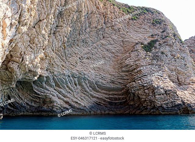 paradise beach of Liapades at Corfu Island (Greece). Sedimentary rock cliff of chalk rocks