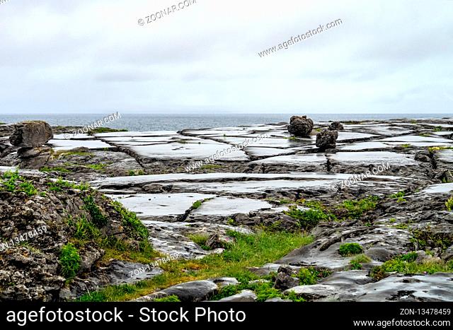 The Burren region, Clare, Ireland. The Burren measures 250 square kilometres and is enclosed roughly within the circle made by the villages of Ballyvaughan