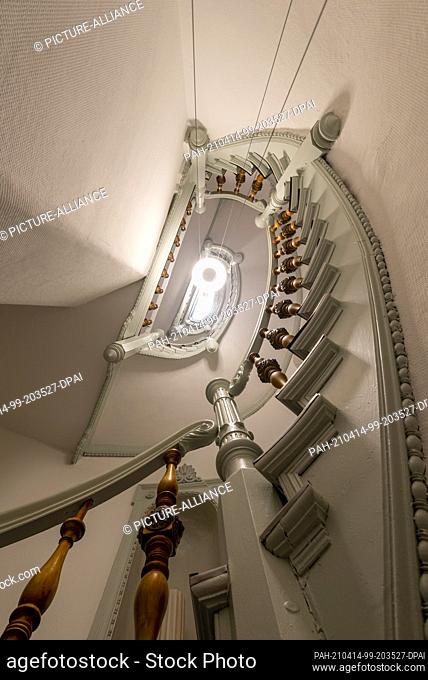 09 April 2021, Saxony-Anhalt, Magdeburg: This staircase with plenty of stucco on the walls is located at Hegelstraße 16. In Magdeburg there are still a number...