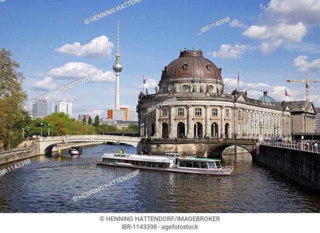 Boat on Spree River in front of Bode Museum on Museum Island and Television Tower, Berlin, Germany, Europe