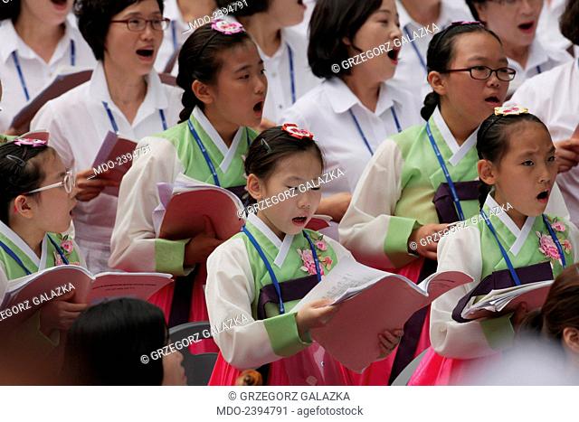 The choir singing during the mass celebrated by the Pope Francis (Jorge Mario Bergoglio) for the Solemnity of the Assumption of Mary at World Cup Stadium during...