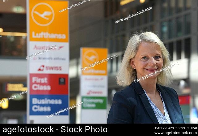 28 April 2022, Hamburg: Sandra Kraft, Press Officer Media Relations Lufthansa Group, stands in the departure area of Hamburg Airport