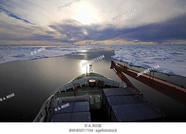 ship in a shipping channel through the pack ice near Ross Island, Antarctica