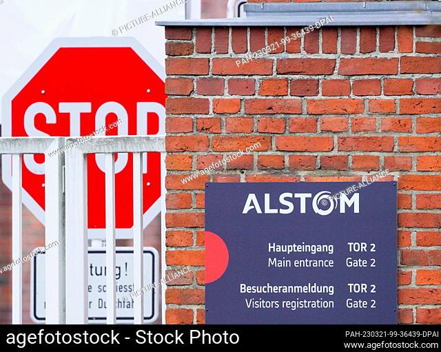 21 March 2023, Brandenburg, Hennigsdorf: The main entrance to rail vehicle manufacturer Alstom. The planned cutback of hundreds of jobs at train manufacturer...