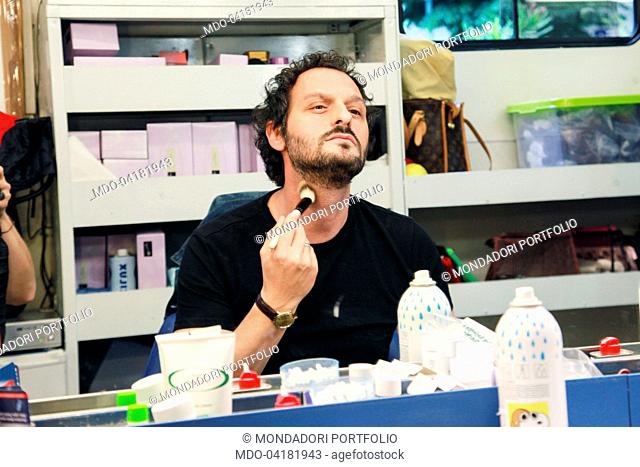 Photo shooting on the set of the TV mini-series Amore pensaci tu. Italian actor Fabio Troiano at the make-up in the dressing room