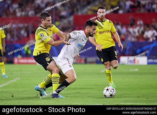 Seville, Spain. 05th October 2022. Suso (7) of Sevilla FC and Raphael Guerreiro (13) of Dortmund seen during the UEFA Champions League match between Sevilla FC...