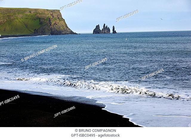 THE BLACK LAVA COLUMNS OF THE REYNISDRANGAR, NATURE RESERVE OF DYRHOLAEY, A VOLCANO-FORMED ISLAND, NOW A PENINSULA NEAR VIK ON THE SOUTHERN COAST OF ICELAND