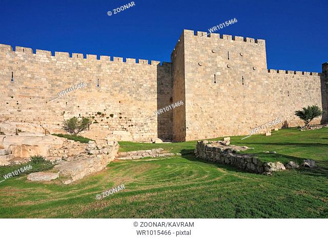 The wall of Jerusalem, lit by the bright sun