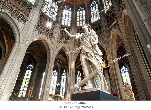 statue by Jacques du Broeucq 16th ct., interior view of abbey church Saint Waltrude, Sainte-Waudru, Mons, Hennegau, Wallonie, Belgium, Europe