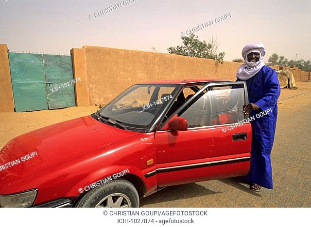 Tuareg with his car in a street of Agadez, Niger, Western Africa