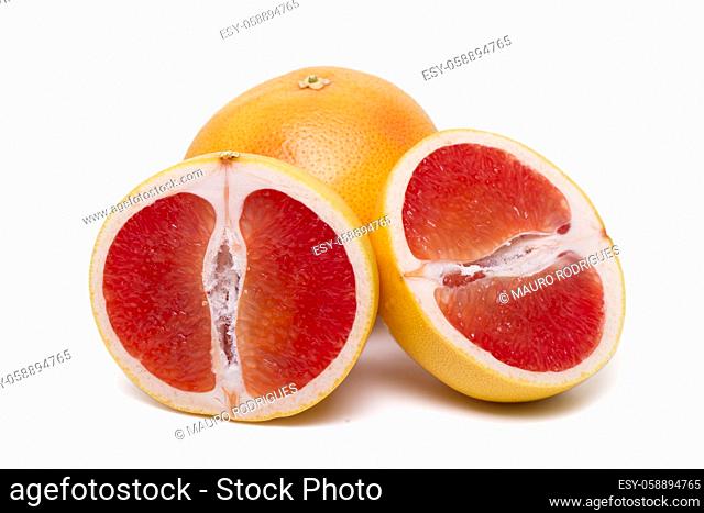 Close up view of a fresh and healthy grapefruit isolated on a white background