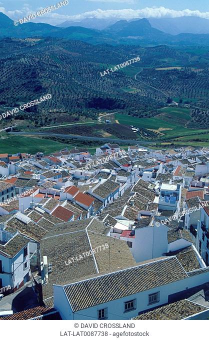 View across rooftops of town. Traditional white houses