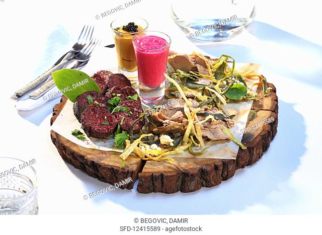 A meat platter with sauces (Ukraine)