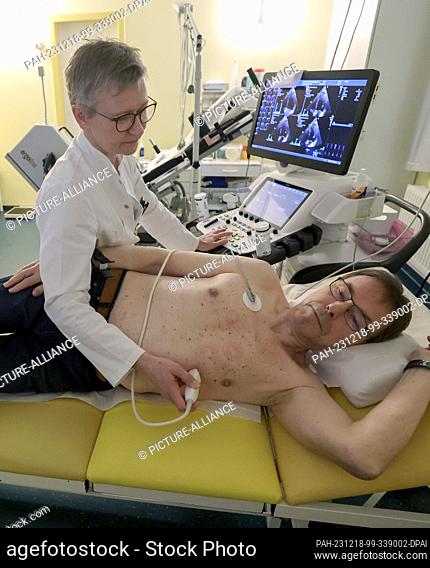 18 December 2023, Mecklenburg-Western Pomerania, Pasewalk: Christine Bahr, a cardiologist, examines a patient in her practice at a press event to launch the...