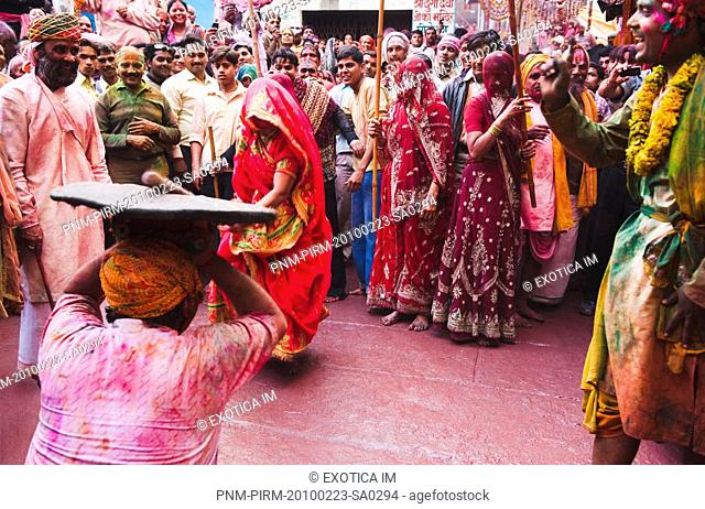 People celebrating 'Lath Maar Holi' festival, Barsana, Uttar Pradesh India