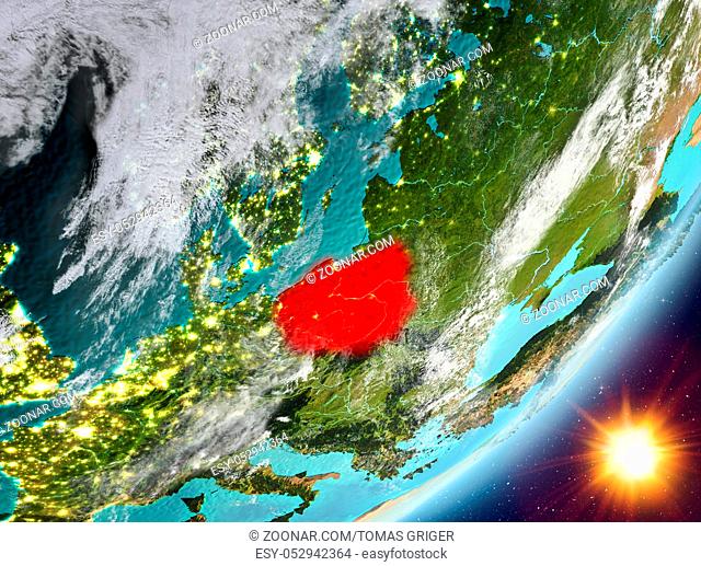 Poland from orbit of planet Earth in sunrise with highly detailed surface textures and clouds. 3D illustration. Elements of this image furnished by NASA