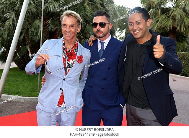 Designer Wolfgang Joop (l), singer Karim Maataoui (r) and guest attend the 2014 World Music Awards at Sporting Club in Monaco, Monte Carlo, on 27 May 2014