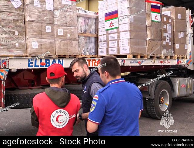 EGYPT - DECEMBER 20, 2023: Men unload humanitarian aid from an Ilyushin Il-76 strategic airlifter as Russia's Emergency Situations Ministry sends more than 18t...