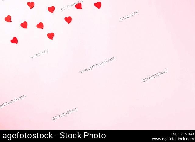 Valentines' day background. red hearts composition greeting card for love Valentines day concept isolated on pink background with copy space