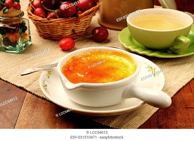 Delicious french dessert creme brulee on the table