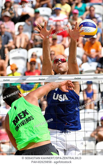 Phil Dalhausser (R) of the USA in action against Rodolfo Lombardo Ontiveros Gomez from Mexico during the Men's Preliminary - Pool C match Dalhausser/Lucena of...