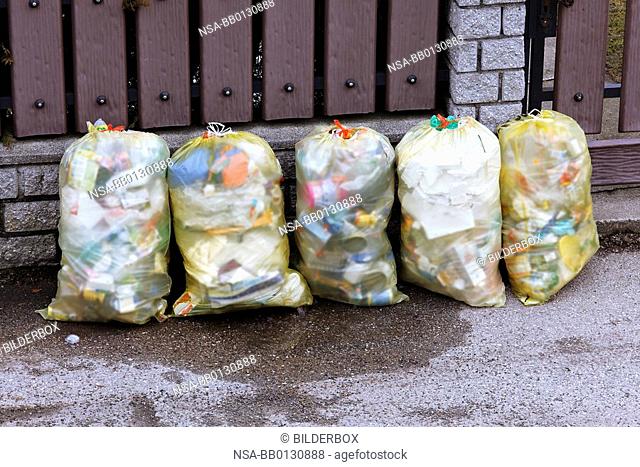 Garbage bags of plastic waste are waiting for waste disposal