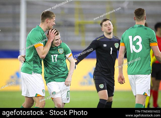 Ireland's Mark McGuinness (L) and Ross Tierney (#17) celebrate after the UEFA European Under-21 Championship qualifying soccer match (group F) between Sweden...