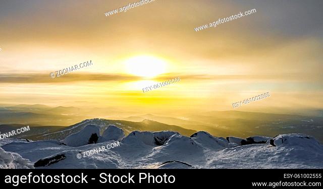 beautiful sunset in the mountains in winter Altai