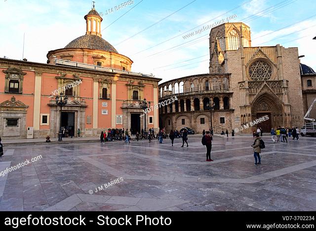 Valencia, Plaza de la Virgen. At left Basilica de la Virgen de los Desamparados, at right Cathedral. Comunidad Valenciana, Spain