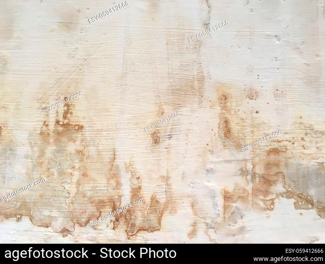 Grungy painted wall texture as background. Cracked concrete vintage wall background, old white painted wall. Background white painting
