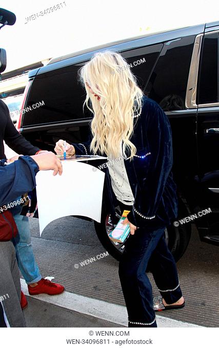 Kesha departs LAX airport in Los Angeles, United States Featuring: Kesha, Ke$ha Where: Lax, California, United States When: 23 Apr 2018 Credit: WENN