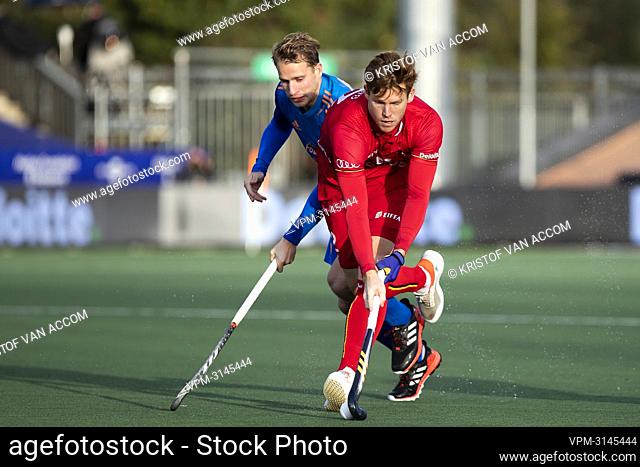 Dutch Dennis Warmerdam and Belgium's Gauthier Boccard pictured in action during a hockey game between the Netherlands national team and the Belgian Red Lions