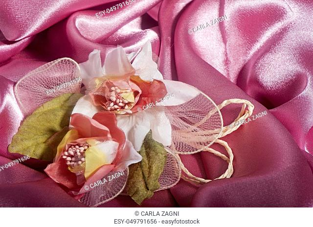 weddings favors on on the elegant backround fabric