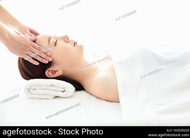 Japanese woman relaxing at a spa